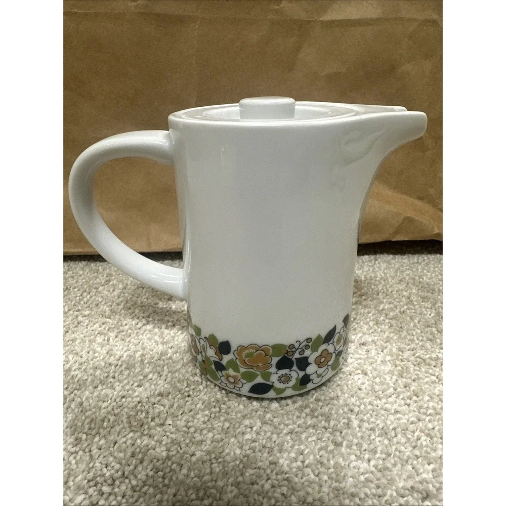 Vintage cream pitcher in the retro floral, manufactured by Suisse Langenthal